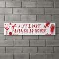 A Little Party Never Killed Nobody Banner on Grey Brick Wall