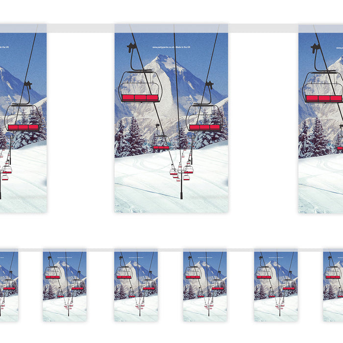 Ski lift with red chairs against a snowy mountain background