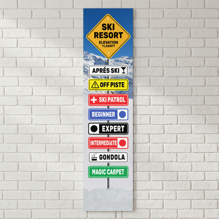 Ski Signpost Banner on White Brick Wall