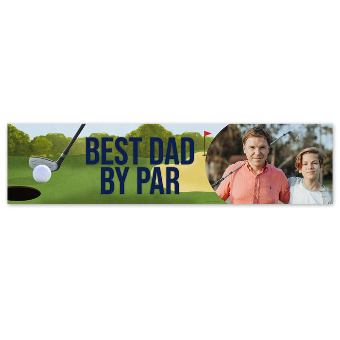 A personalised golf banner with the text 'BEST DAD BY PAR' on a background of a golf course, featuring a photo of a man and a woman.