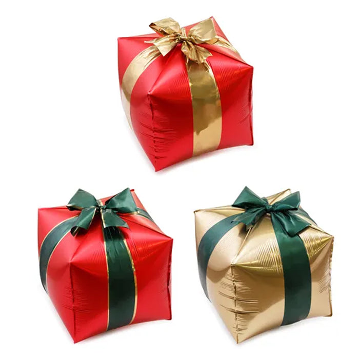 Three inflatable gift boxes wrapped in red, gold, and green ribbons on a white background