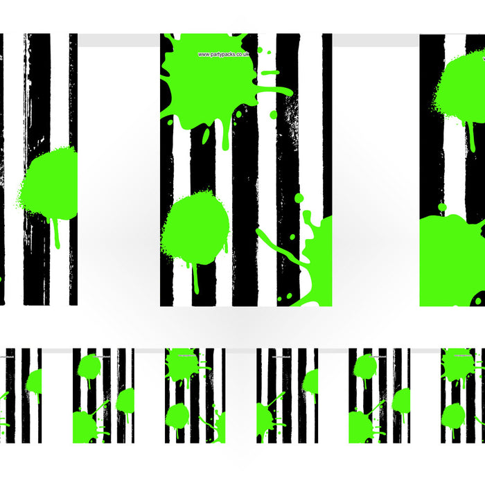 A Halloween paper bunting with a ghost theme, featuring black and white stripes with green splashes and ghost cut-outs.