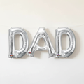 Silver DAD Foil Balloons on Wall