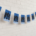 Dancing Queen Bunting on White Stone Wall