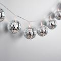 Silver Disco Ball Lights Extreme Close Up Plain Silver Background