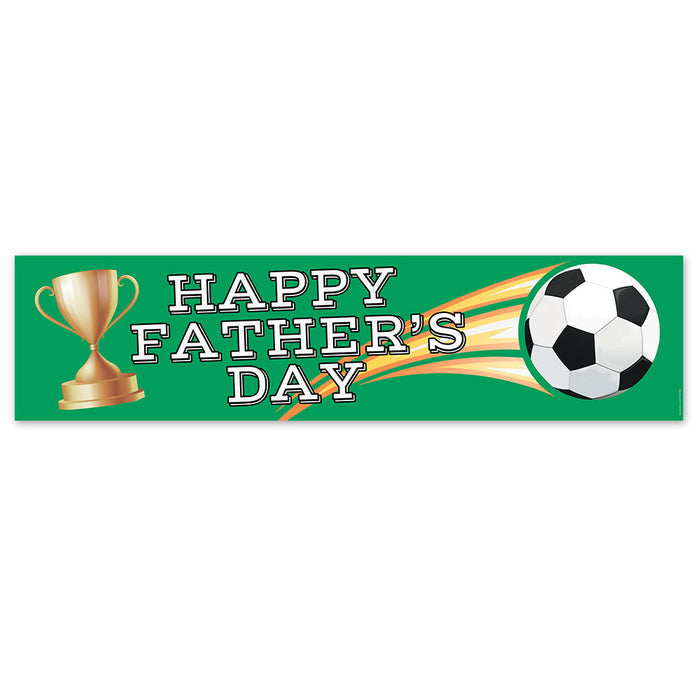A long paper banner with a green background featuring a white soccer ball, a golden trophy, and the text 'HAPPY FATHER'S DAY'.
