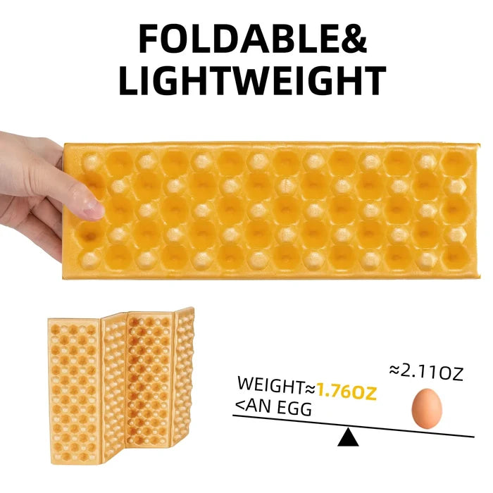 Foldable and lightweight ice cube tray with a hand holding it, showing its size compared to an egg.#color_Yellow