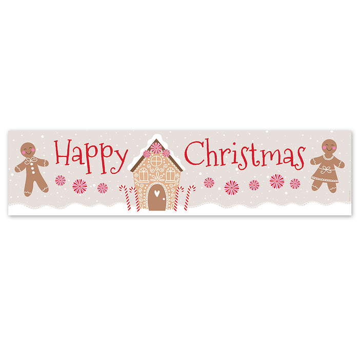 Decorative Christmas banner with gingerbread men and a house on a white background