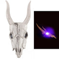 Bull skull with glowing purple light on a white background