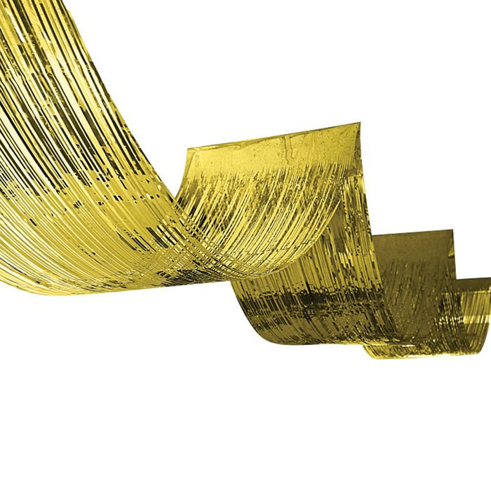 A close-up image of a gold metallic fringe ceiling drape, showing the shiny texture and fringed detailing.