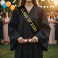 Class of 2026 Sash on Female Graduate