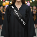 One Degree Hotter Sash on Female Graduate