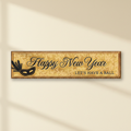 Gold masquerade Happy New Year banner against a cream wall