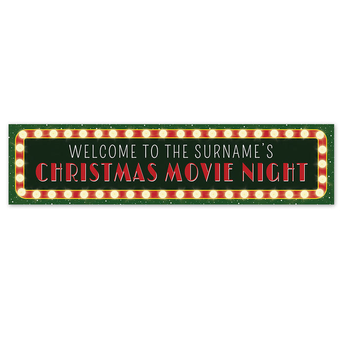 Decorative sign with 'Welcome to the surname's Christmas Movie Night' text on a green background with red and white text.