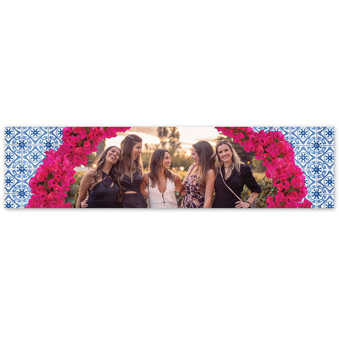 A personalized banner with a photo of a group of people surrounded by a floral pattern and Greek tile design.