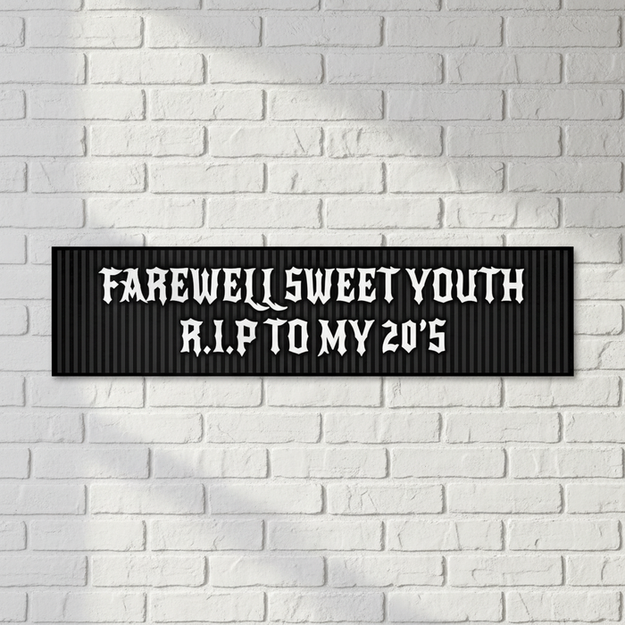 Farewell Sweet Youth Banner on White Brick Wall