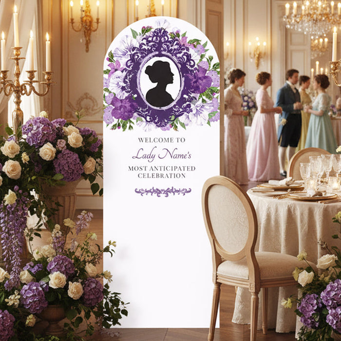 Decorative arch with floral design and text in a formal setting with guests and table.