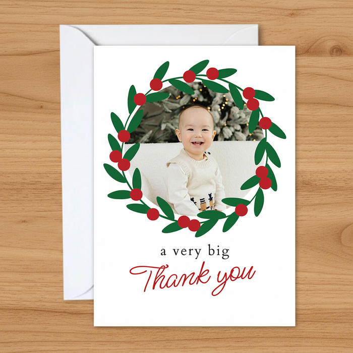 Christmas wreath thank-you card on wood