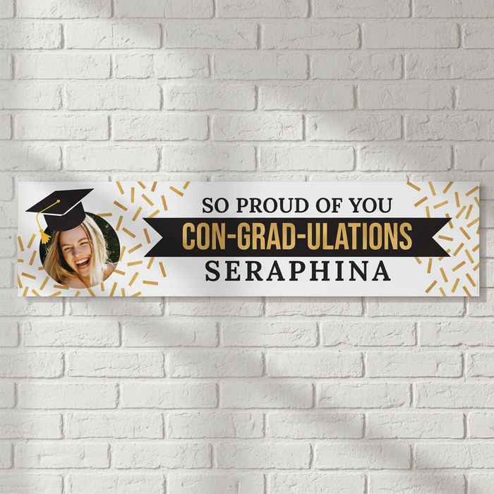 Con-Grad-Ulations Banner on White Brick Wall