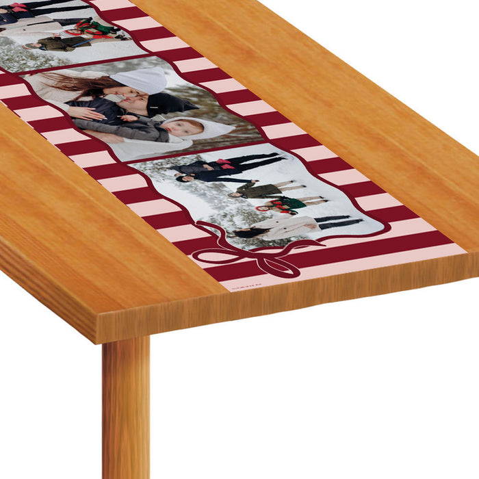 Table runner with family photos on a wooden table