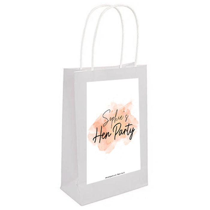 A white paper party bag with handles featuring a rose gold blush watercolour design and personalized text reading 'Sophie's Hen Party'.