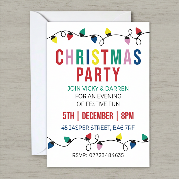 Christmas party invitation on grey wood