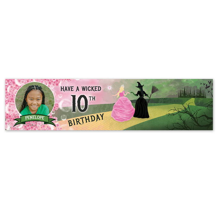 A personalised photo banner with a theme from the Witches of Oz, featuring character silhouettes and a custom message for a 10th birthday.