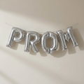 PROM Silver Foil Balloons Arched Like Bunting on Wall