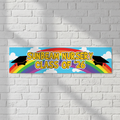 Rainbow Nursery Graduation Banner on White Brick Wall