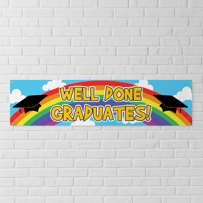 Well Done Graduates Banner on White Brick Wall