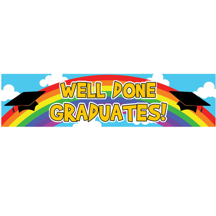 A colorful paper banner with a rainbow design and graduation caps, stating 'Well Done Graduates!' in a playful font.