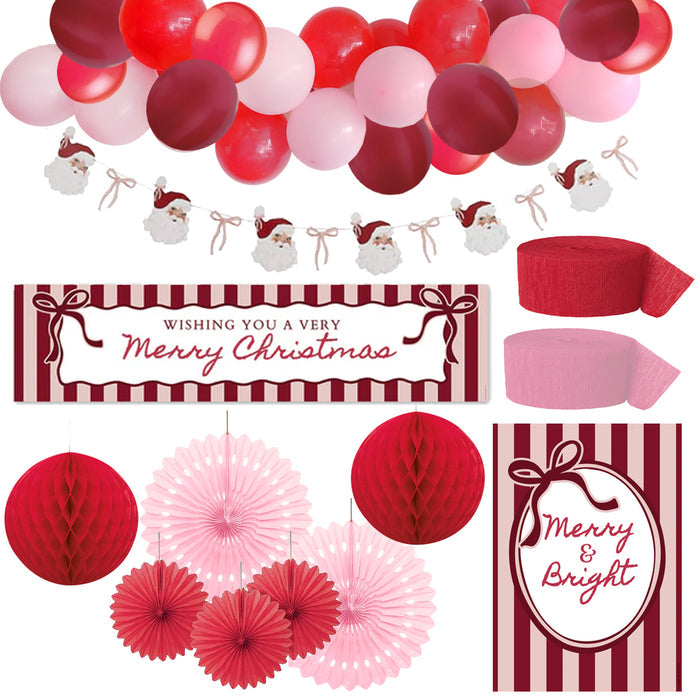 Collection of Christmas-themed party decorations including balloons, banners, and paper fans on a white background.
