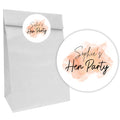 A white party bag with a personalized pink and orange watercolor sticker that reads 'Sophie's Hen Party'.