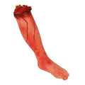 A fake severed leg prop with a simulated blood wound, primarily red in color.
