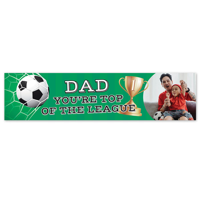 A personalised banner with a football theme, featuring the text 'DAD YOU'RE TOP OF THE LEAGUE' along with a photo of a father and child, and a trophy image.