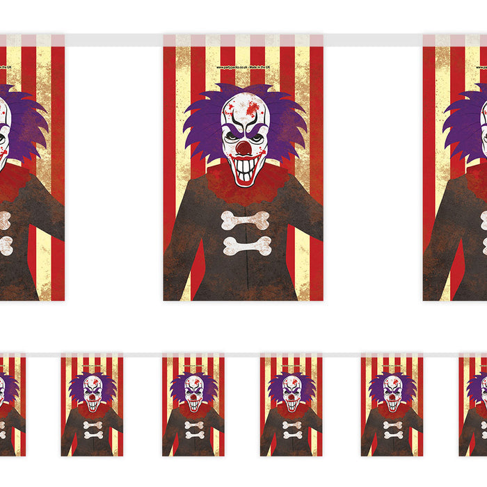 Decorative banner with a clown design on a red and white striped background