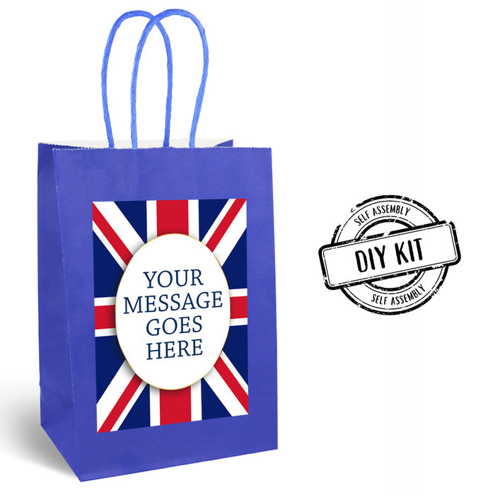 A blue paper party bag with a Union Jack design featuring a space for a personalized message, accompanied by a 'DIY Kit' stamp.