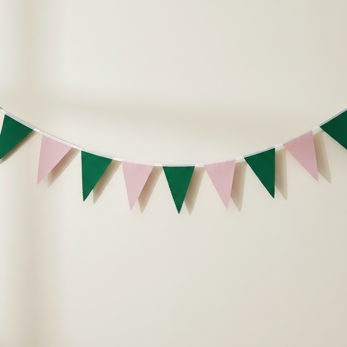 Witches of Oz Pink & Green Fabric Bunting on Neutral Wall