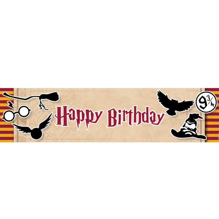 A 'Happy Birthday' banner with wizard-themed decorations including icons like a Sorting Hat, broomstick, owl, glasses, lightening bold scar, Golden Snitch, and a sign for platform 9½.